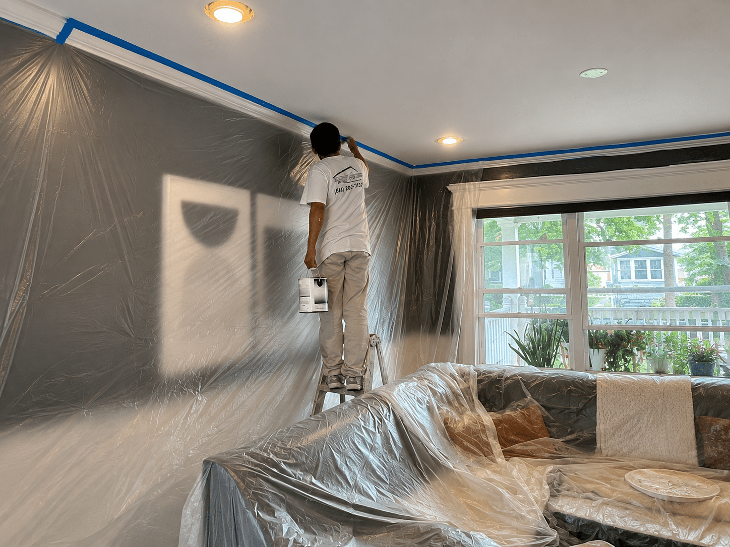 Professional painter completing interior house painting in Chicago