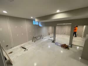 Man working in unfinished basement