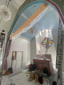 Church altar covered for painting