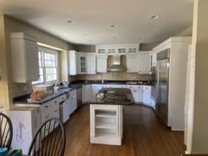 Finished kitchen with white cabinets